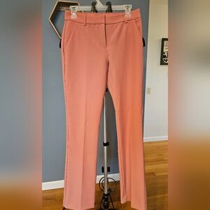 NWOT - EXPRESS COLUMNIST BARELY BOOT PANTS NEVER WORN. LIGHT PINK